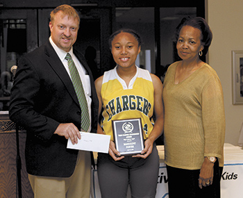 Teen Camper Leadership Award:  Mahogony Foster (center), a Crest High student, is congratulated by Josh Propst, Exeucutive Director and Mary Pass, Program Director for her leadership during the Jack & Ruth Schweppe Summer Day Camp.