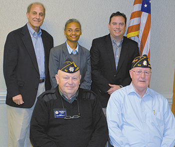 Standing, left to right, Ali Paksoy, Tasjsha N. Eaves; Greg McIntyre; seated, Stephen Jolly and Doug Gold