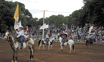 The Annual Bar H Rodeo in Boiling Springs opened with a parade of flags, prayers, and a salute to our nation.