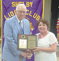 Barbara Fitch (right) receives the Jack Stickley Fellowship from Lion Joe Davison.
