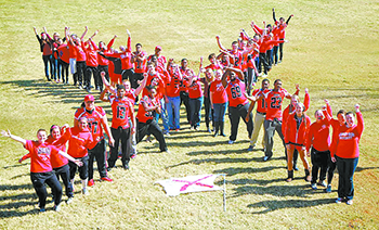 Release the Captives members form an "X" to symbolize the group's goal of ending human trafficking.