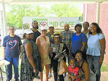 Members of the Common Ground Cafe team pause for a photo at the June pop-up event at Holly Oak Park in Shelby.