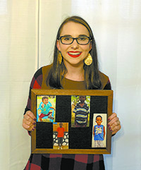 Caroline with photos of the children she currently sponsors.