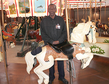 Shelby Carrousel operator Henry Hartley says he loves his job
