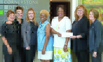 Left to right: Nicole Bell, Heather Watts, Lacey Tindall, Venita Roberts (WOM assistant executive director), Frances Webber (WOM executive director), Hope Weaver, and Melissa Guy.