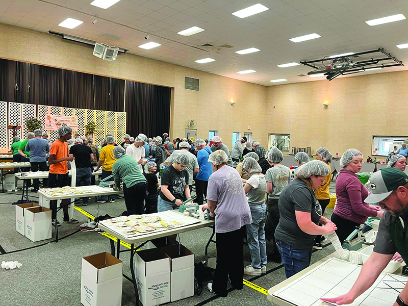 Another view of the Crest FFA student-members and volunteers preparing food for the 50,000-plus Meals of Hope plates. (Photo provided)