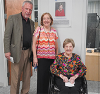 Dot Roark (right) is pictured with her son Jeff Roark, and daughter Pam Washer, in front of a commemorative plaque in the new C19 studio.  (Photos provided)