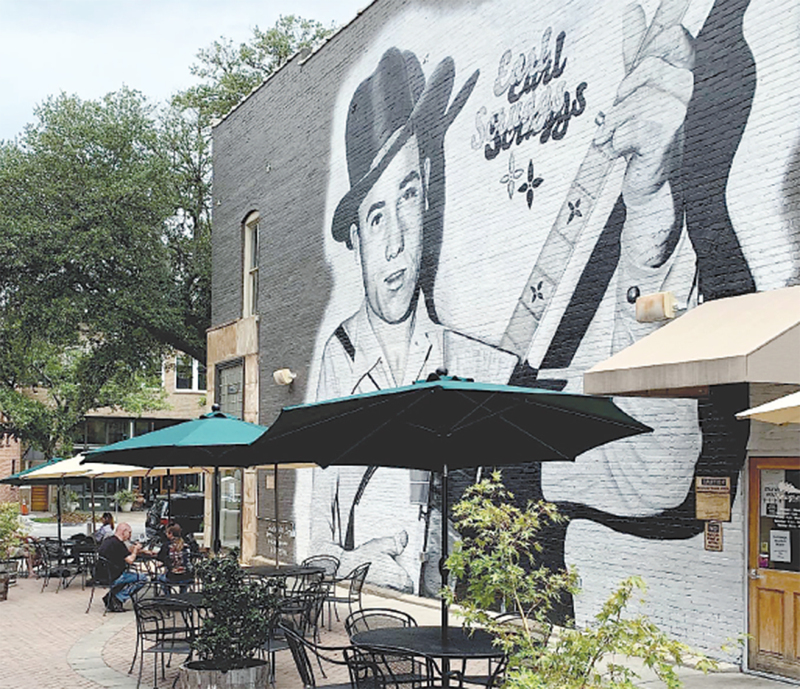 A mural honoring Earl Scruggs has been painted on the popular pedestrian alley side of Newgrass Brewing Company in Shelby. It was painted by artist Scott Nurkin of The Mural Shop in Chapel Hill, NC.