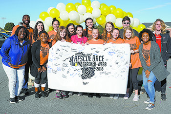 Organizers from last year's Rescue Race celebrate raising  $3,464 - enough to fund the rescue of three child slaves. They hope to raise even more at this year's race.