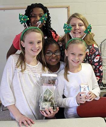 Pictured front left to right: Chloe Ingle, A\'Kyra Toms, and Riley Ingle. Back: La\'Ryssa Harris and Brooklyn Pendleton at Washington Elementary Fundraiser.