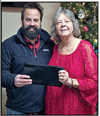 Susan Whetstine presented $5000 to Mark Blackwell of Justice Ministries.