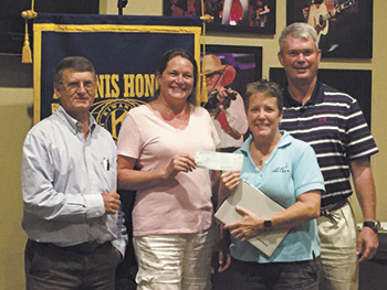 (Left to Right): Jamie Richard (Kiwanis Club President), Kristin LaFluer (Hearts and Hooves Program Instructor, North Shelby School), Shelley Brown (Physical Therapy Assistant, North Shelby School), Marvin Hutchison (Board Member, North Shelby School).