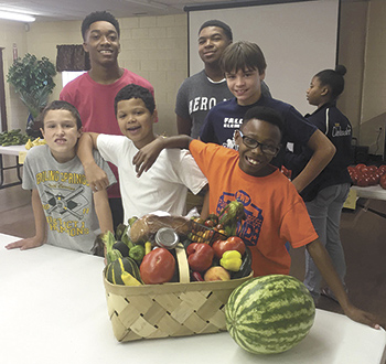 Rising sixth grade students and student helpers Isaiah and Cameron.