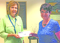 Myra McGinnis, CEO of Hospice Cleveland County, left, with Kathryn H. Hamrick 