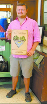 First-time donor Nick Carpenter, head of a new Cleveland County business Nick & Sarah's River Excursions, stopped by the Museum this week to donate several certificates for local guided river tours.