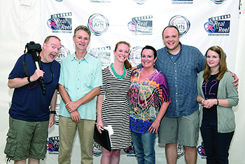 Linda Pandolph (third from right), executive producer of the 2016"Best of Fest" film, "Last Man Club," receives her award during the wrap party last year.