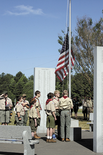 This American flag which has flown over the Belwood War Memorial for the past year is lowered to be retired.
