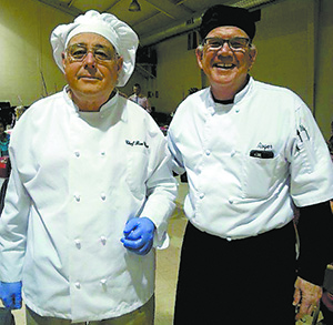 The late, Ron Wilson, left, and Roger Vassey, right, pose at a "Truth & Tea Time" dinner last spring.