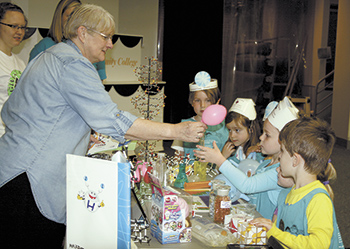 Joanne Cox of the CCC Chemistry Department displays a chemical reaction for Pre-K students from First Baptist Church of Shelby.