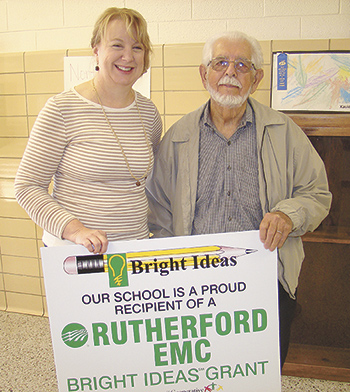 North Shelby School teacher Sara Grant was awarded a Bright Ideas grant for $591 from REMC director Kenneth McDaniel for her project, "Interactive Drumming for Math."