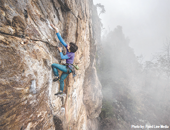 Erica Lineberry climbs at Crowder's Mountain State Park on a recent winter morning.