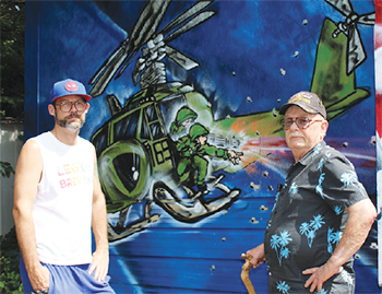 This portion of the mural is of a Huey gunship, similar to what Sgt. Whitaker was on as a door gunner. (photos by MEP/CF Media)