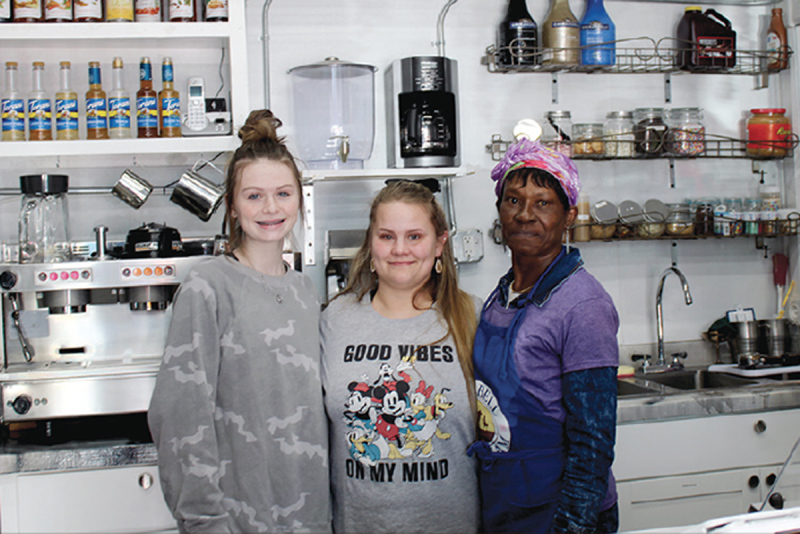 The Kingdom\'s Cup is managed by Jennifer Tomlin (center), with baristas Lainey Bradley and Tajuana Tate helping out in the day-to-day operations. (photos by Michael E. Powell/CF Media)