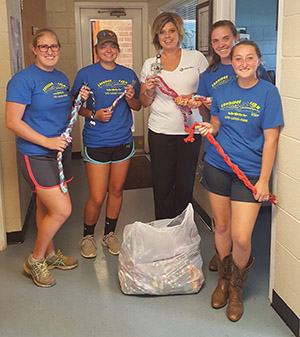 Jonie Stumbo, assistant camp director; Alyssa Goble, camp counselor, Holly Wall, Coordinator of Health Services with Cleveland County Animal Control Services; Alyssa Miller, camp counselor; and Kayla Hyde, camp counselor.