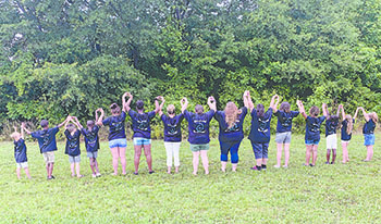 Laura\'s Homes residents model new t-shirts. Laura\'s Home has served 178 children since opening its first Cleveland County group home in 2005.