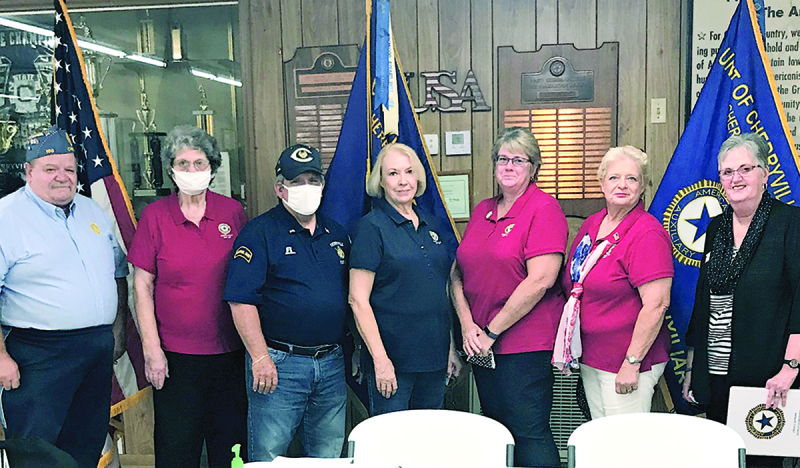 A group photo of the American Legion Post and Unit 100 officers. Left to right are: Sons of the American Legion Squadron 100 Commander Dan Hausler; ALA Unit 100 Chaplain, Ann Craft; Post 100 Commander Mike Robinson; ALA Unit 100 VP, Jean Skibo; ALAL Unit 