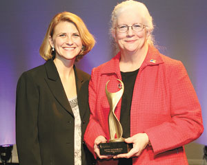 Dottie Leatherwood of the Cleveland County Healthcare System (right) with Chamber Chair Shannon Kennedy. Dottie received the Athena Award. 