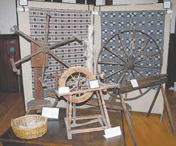 Textile production equipment on display at the exhibit.