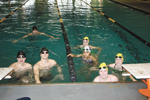 Pictured in the back is Austin Toney; on the wall (left) are Kendall Corbett and Evan Morse. The ladies on the right from back to front are Emily Morgan, Erin Riggs, 
