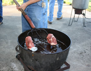 Steaks ready to go into the boiling peanut oil.