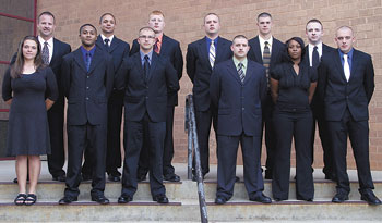 Day Class â€“ Front left to right: Alexis Inman, Jeremy Marable, James Allen, John Robbins II, Brittney Simmons, Joshua Wall. Back left to right: Austin Reulecke, Edmund Davis, Christopher Mauney, Shane Summer, William Bailey III, Tyler Lane