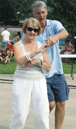 From Charlotte, annual BeachBlast fans,  Barbara Toney and Mike Howard show off their shagging steps.