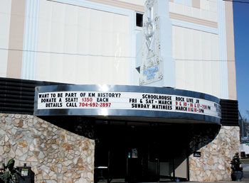 Joy Theatreâ€™s marquee displays the upcoming events.