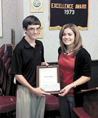 Exchange Club ACE Award winner David Cooper with Club Member Ashley Costner.