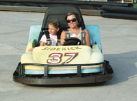 Sharon Nivens and her daughter Jami were enjoying a ride, in the â€œSidekick # 37â€ car, around the Grand Prix track.
