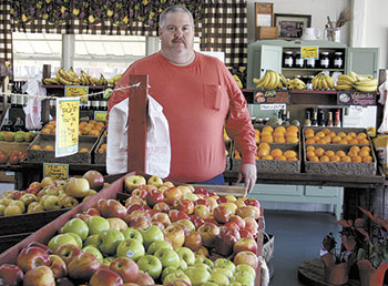 John Carroll, Co-Manager of Rhodesdale Farm, located at 811 Shelby Road, Kings Mountain.