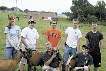 Crest FFA members standing (l to r) are Lisa Humphries, Justin Henson, Ryan Lancaster, Landon Costner and Josh Bolin. Up front is Matt Harris, Crest FAA head teacher and Johnathan Henson. The group is known as â€œthe goat tendersâ€.
