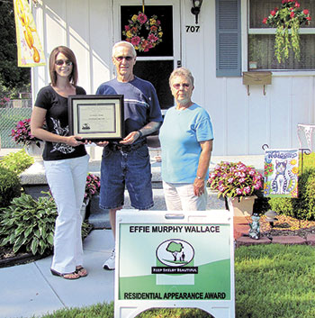 707 Royster Avenue. Dana Scoggin, Donald Cooke and Faye Cooke.