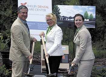 Drs. Brenton Young, Pauline Cahill and Jessica Lackey proudly break ground for the new Shelby Dental Care Center.