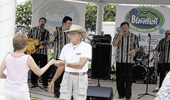 Ann Reavis and Bob Dezern, from Kernersville, N.C., shag to the music of the Fantastic Shakers at BeachBlast 2013 last weekend. The couple have been dance partners for 12 years. 
