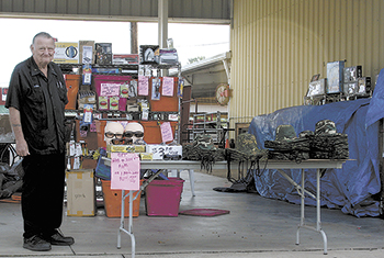 "Satellite Sam" from Lynchburg, Virginia prepares his booth  at this yearâ€™s Shelby Hamfest.