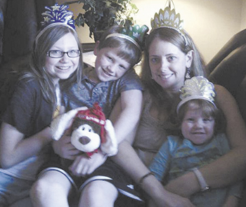 Bethany Johnson Preston with her two daughters, Brayden and Kadence; and son, Trevor.