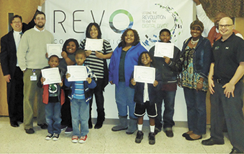 Pictured(l-r): Bryon Gragg, Shelby Revo representative; Brad Andrews, Turning Point Academy, teacher, Jaqurion French, Essence Ervin, Jakeem French, Rita Ervin, grandmother Rita Ratchford; and Izay Bridges, Ikee Bridges, sons of Elesha Johnson, Rodney Bor