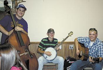 The â€œBuzzardsâ€ band (l to r) Tripp Camp, Chris Dedmon, and Matthew Dedmon provided the entertainment for this yearâ€™s banquet.