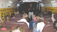 Burns High School students inside the classroom section of the Choice Bus.