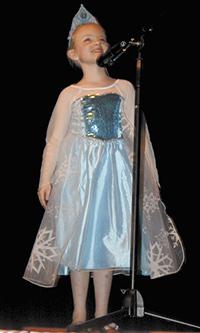Abby Ellis a first grader was one of 34 acts, that featured 51 students. She sang the ever popular and favorite  "Let It Go"!